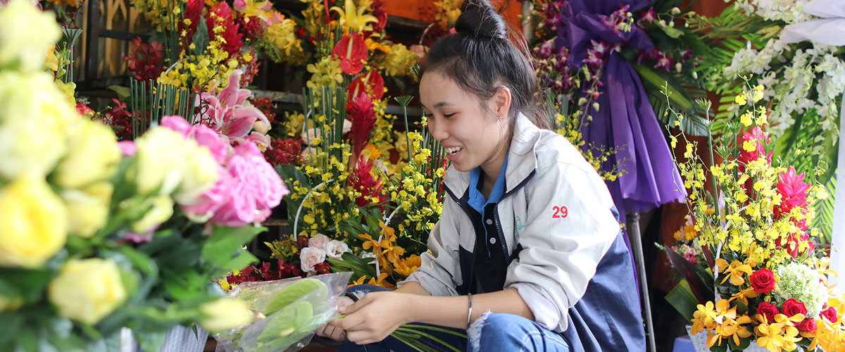 Saigon Showers Bring Tết Flowers