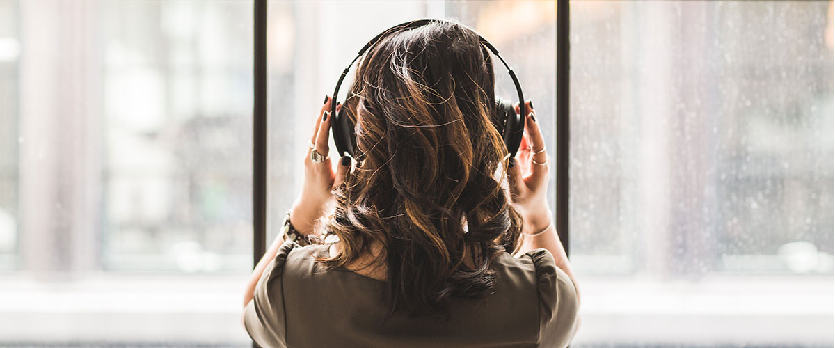 6 Wellness Podcasts to Lift Your Spirits