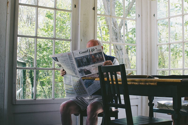 Retirement Old Man with Newspaper