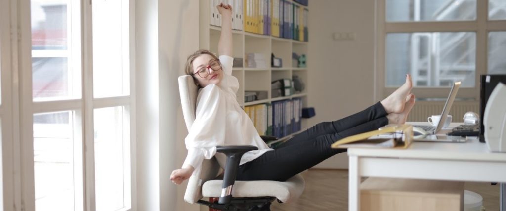 Women Stretching in office