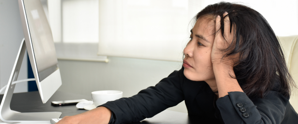 Woman working_Office Wellness Guide: Productivity Hacks to Avoid a Midday Slump